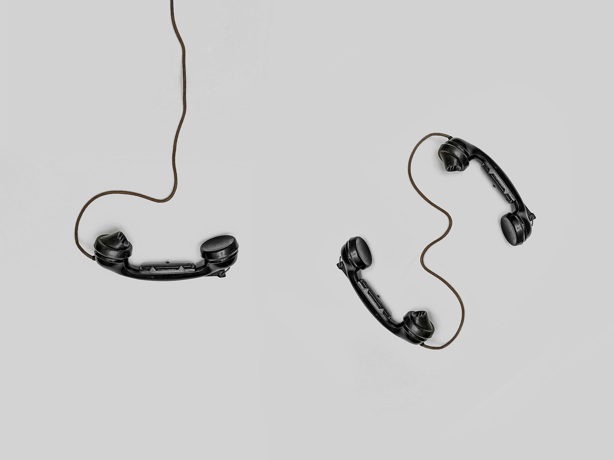 Three telephone handsets