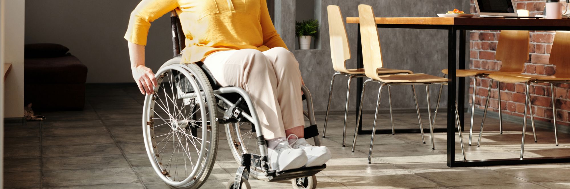 Wheelchair user in room