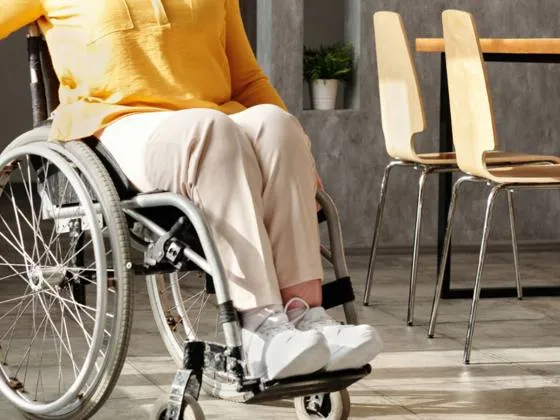 Wheelchair user in room